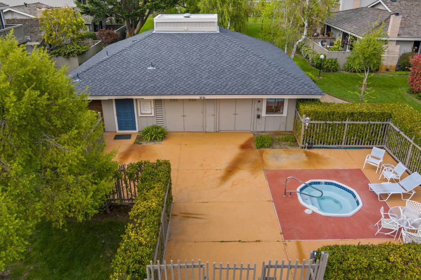 3850 Rio Road, Unit 21 Carmel, CA 93923 - Photo 27 of 31 a aerial view of a house with swimming pool and patio