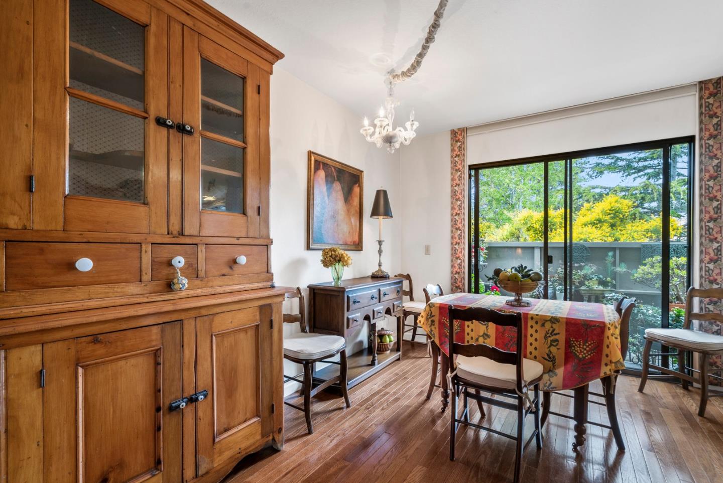 3850 Rio Road, Unit 21 Carmel, CA 93923 - Photo 6 of 31 a view of a dining room with furniture window and outside view