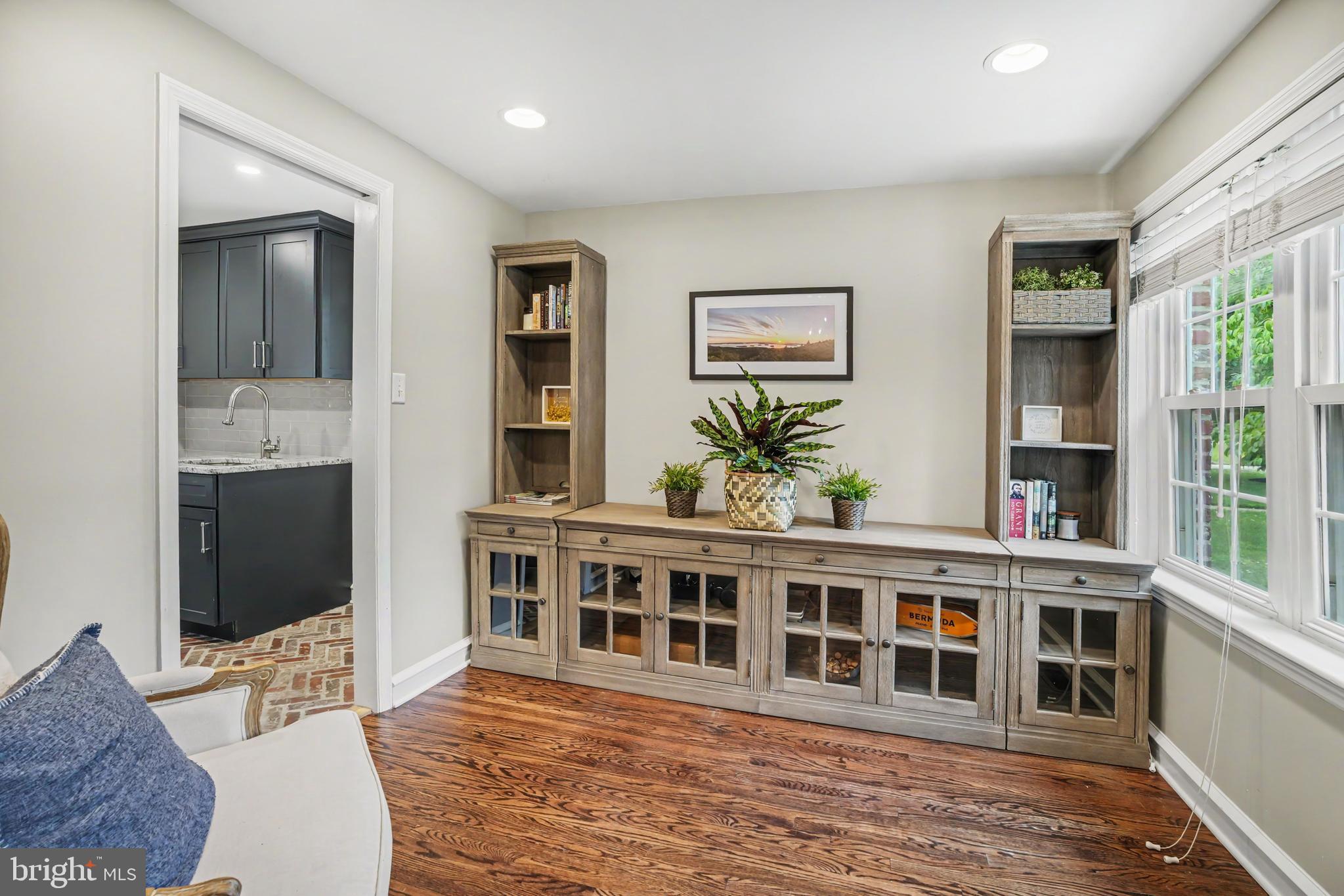 235 Hopkins Road Haddonfield, NJ 08033 - Photo 21 of 47 a living room with furniture windows and wooden floor