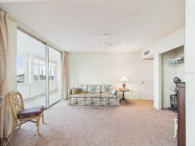 a kitchen with stainless steel appliances granite countertop a sink and a stove