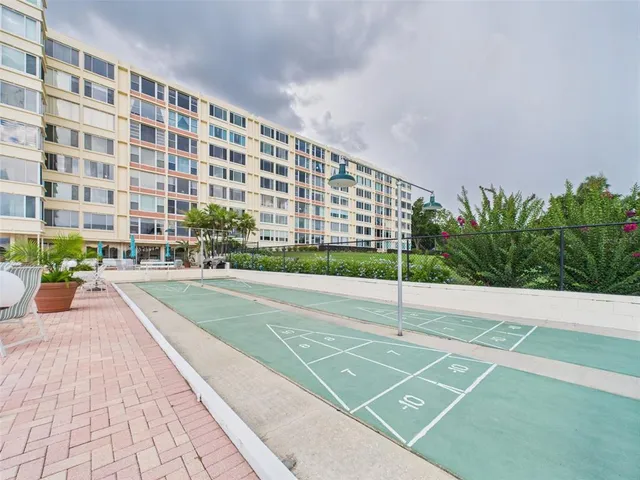 a room with furniture and a book shelf