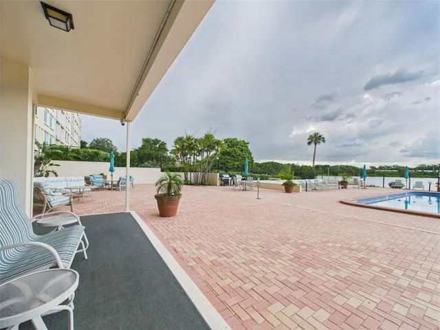 a living room with lots of furniture and window