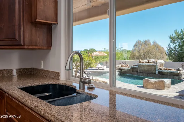 a view of a livingroom from a hallway