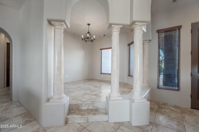 a kitchen with a sink and a refrigerator