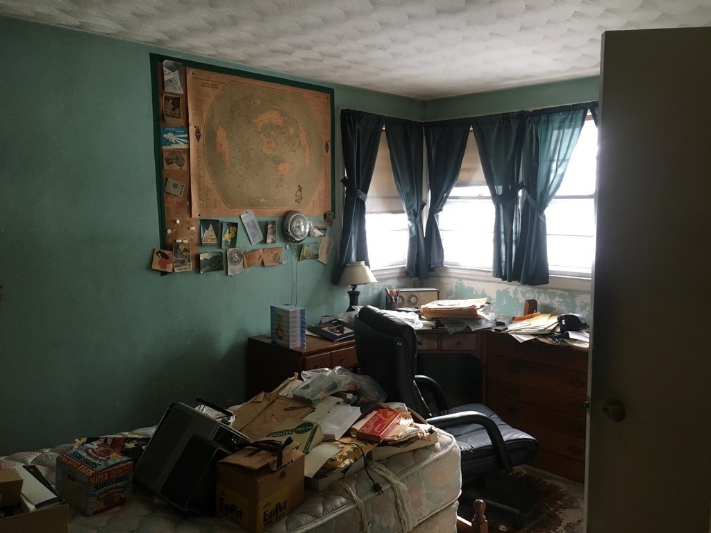 49 Indian Spring Road Ashland, MA 01721 - Photo 13 of 18 a room with furniture and window