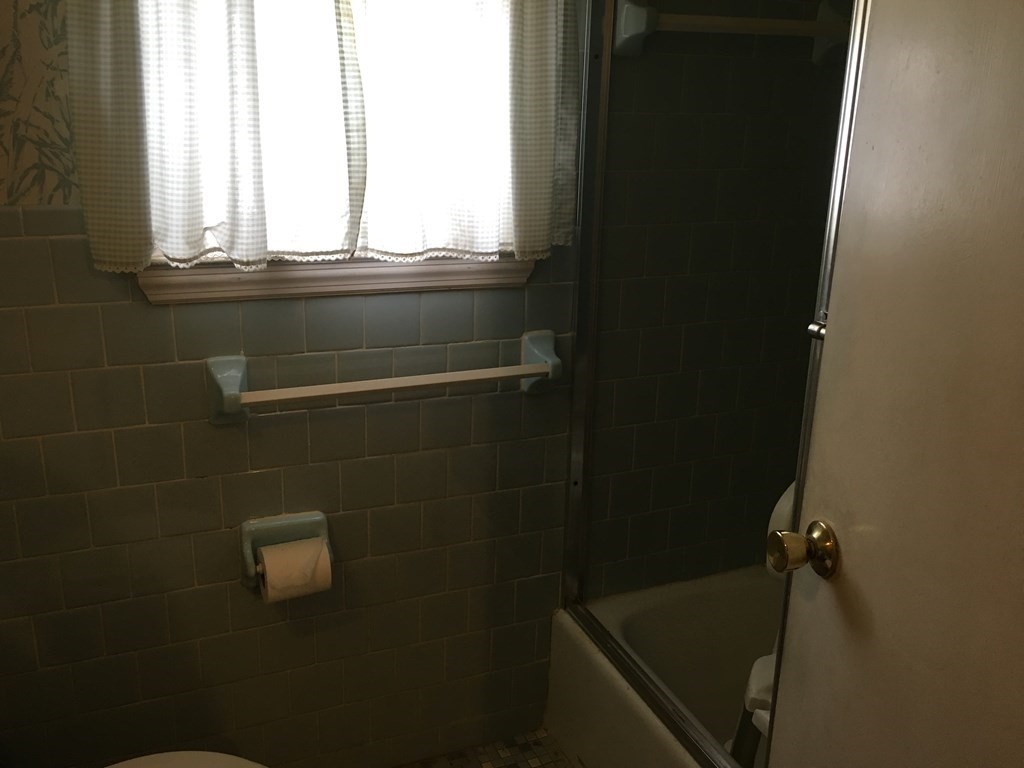 49 Indian Spring Road Ashland, MA 01721 - Photo 15 of 18 a bathroom with a bathtub