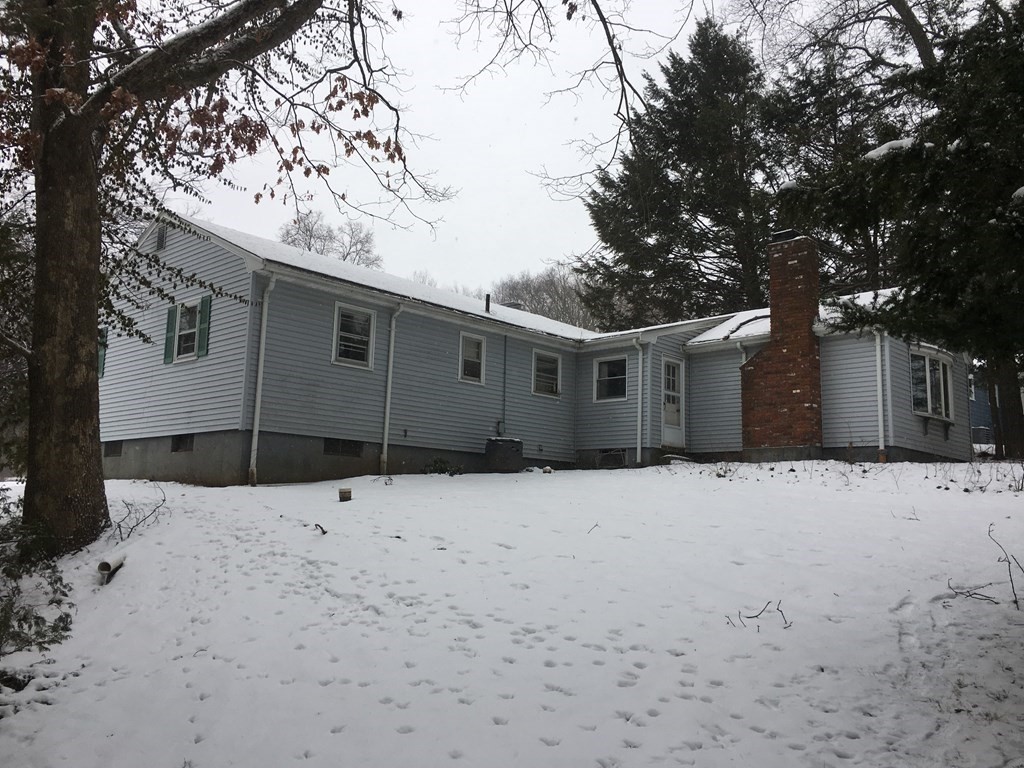 49 Indian Spring Road Ashland, MA 01721 - Photo 2 of 18 a view of a house covered in snow