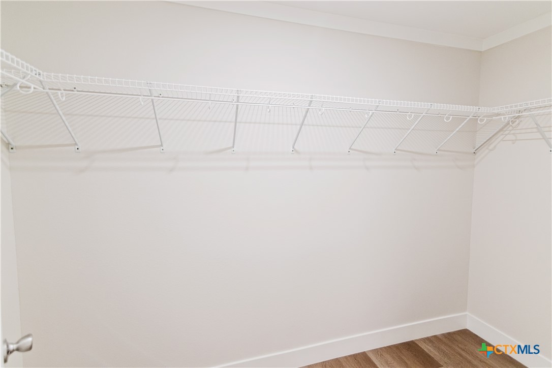 404 Bridge Street Cuero, TX 77954 - Photo 39 of 40 a view of a room with racks on the wall