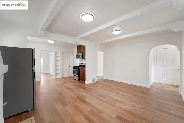a kitchen with granite countertop a stove and a sink
