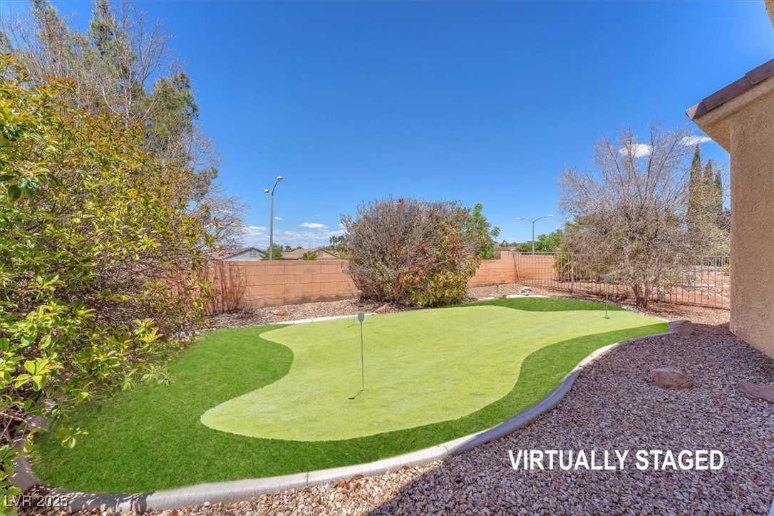 3056 Monroe Park Road Henderson, NV 89052 - Photo 22 of 28 View of yard featuring a fenced backyard