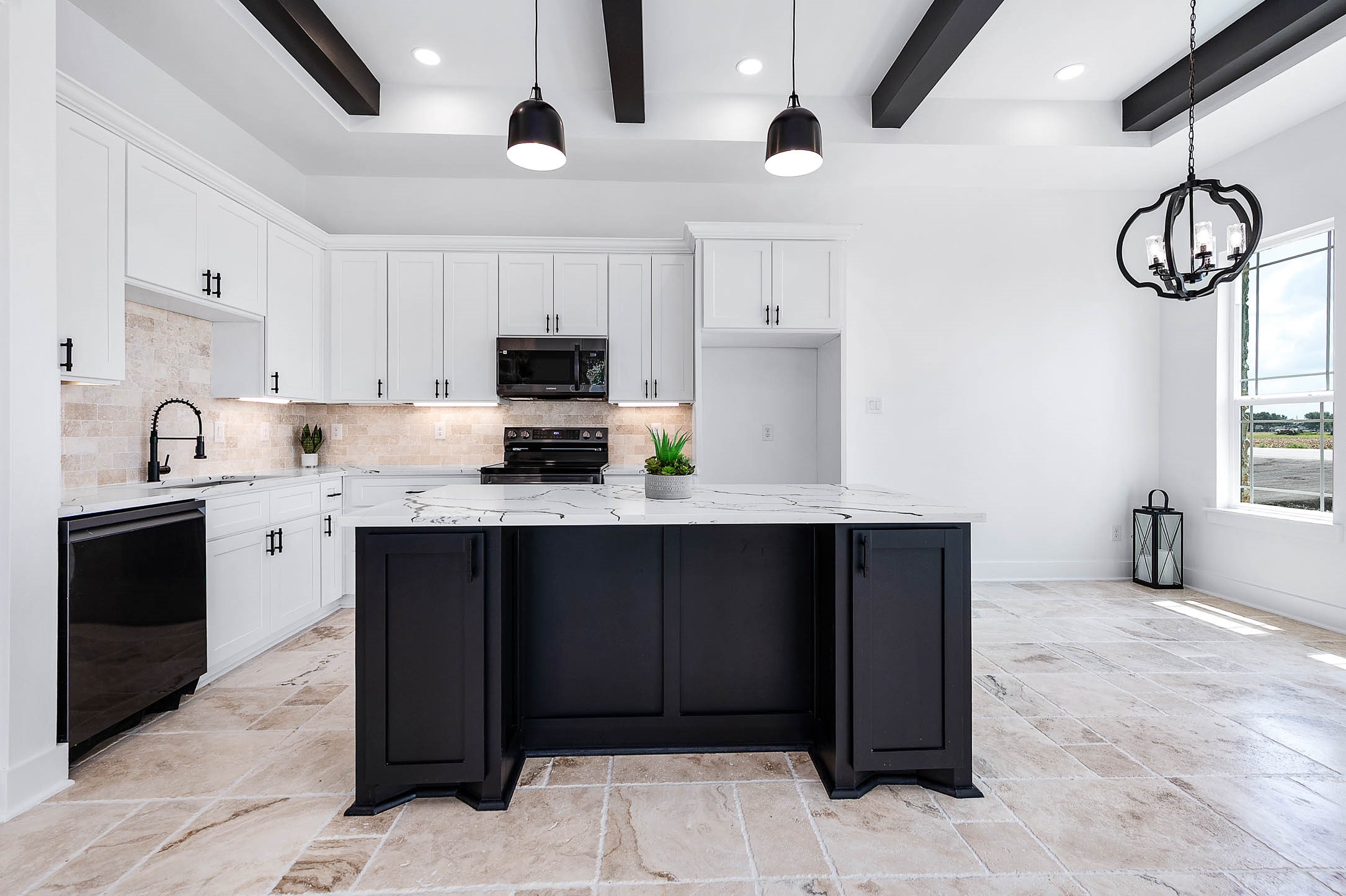 8903 Milby Street Needville, TX 77461 - Photo 11 of 32 a kitchen with a sink cabinets and window