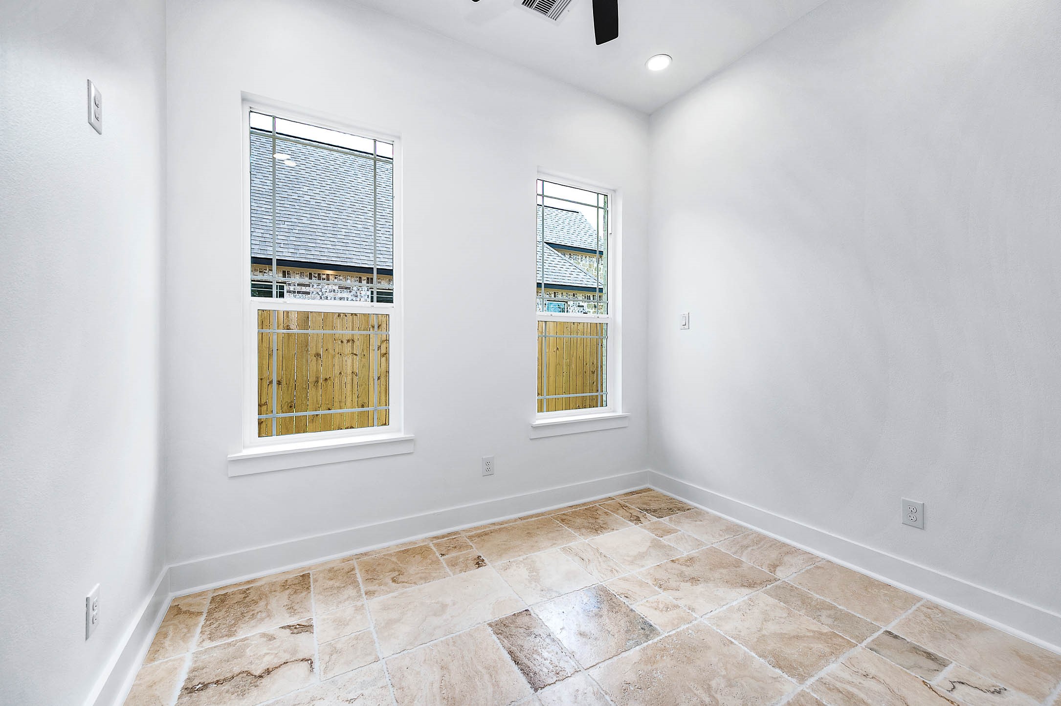 8903 Milby Street Needville, TX 77461 - Photo 17 of 32 an empty room with windows and closet