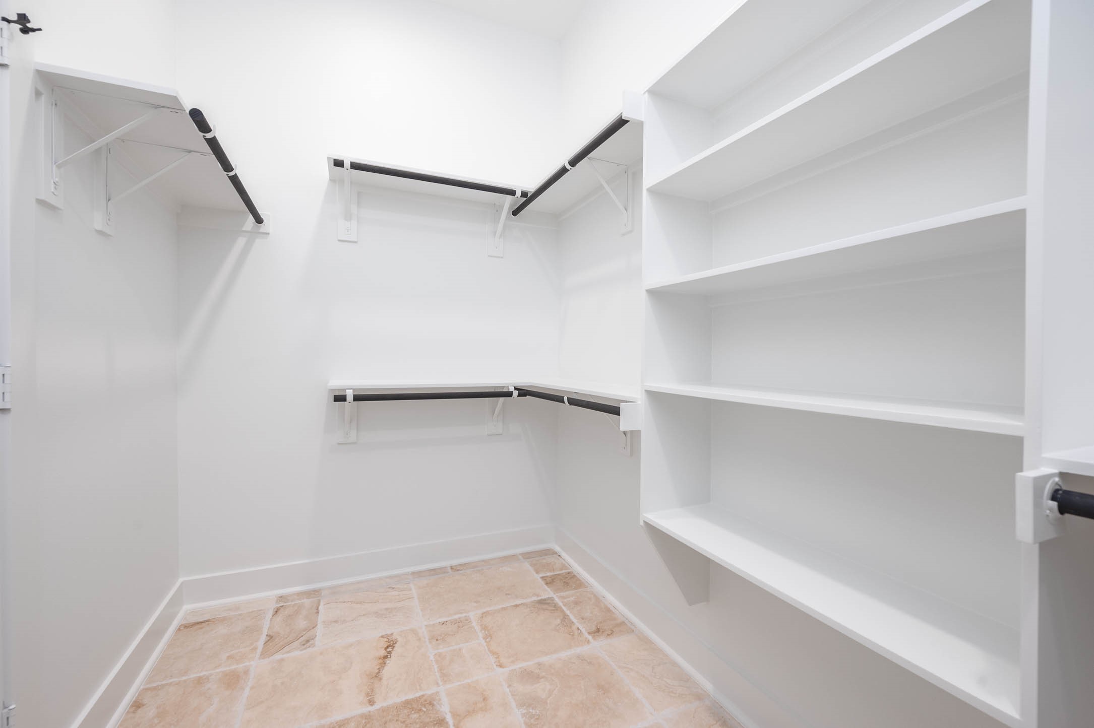 8903 Milby Street Needville, TX 77461 - Photo 26 of 32 a view of an empty walk in closet