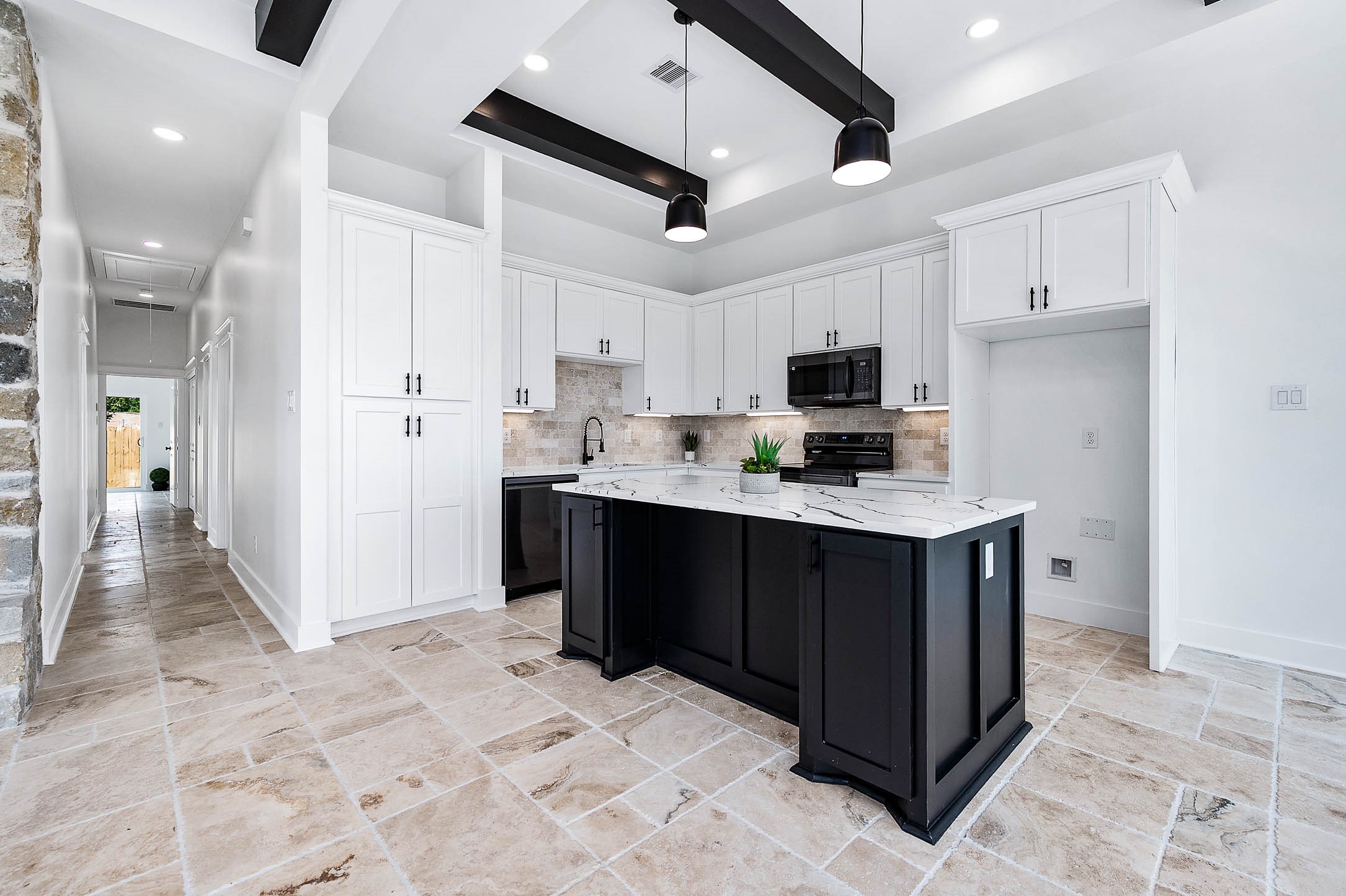 8903 Milby Street Needville, TX 77461 - Photo 10 of 32 a kitchen with stainless steel appliances kitchen island granite countertop a refrigerator and a stove top oven