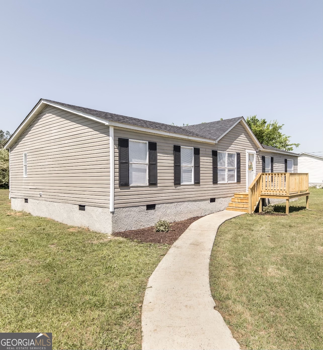 a house view with a outdoor space