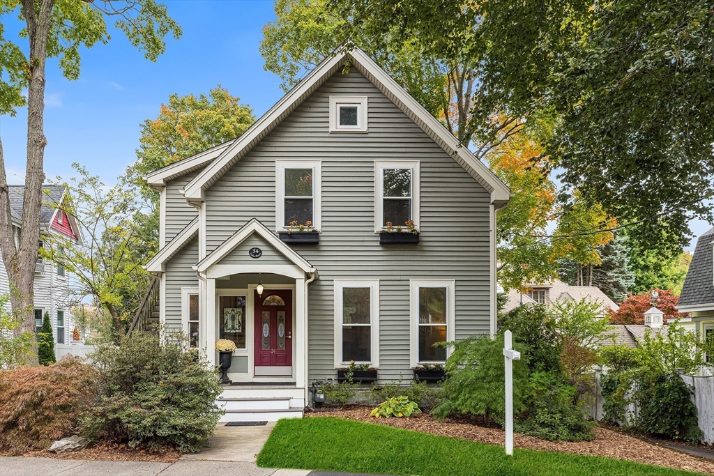 34 Cedar Street Wakefield, MA 01880 - Photo 1 of 33 a front view of a house with garden