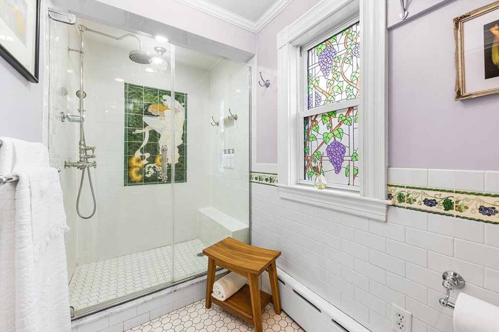 34 Cedar Street Wakefield, MA 01880 - Photo 14 of 33 a bathroom with a window and a shower