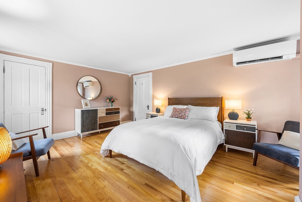 34 Cedar Street Wakefield, MA 01880 - Photo 18 of 33 a bedroom with a bed and window