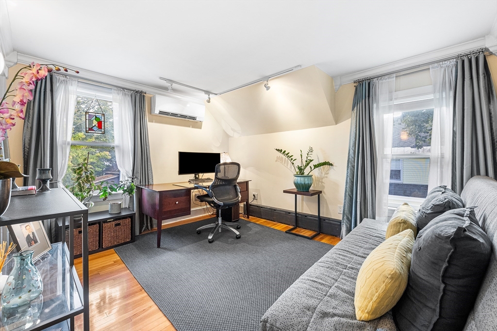 34 Cedar Street Wakefield, MA 01880 - Photo 19 of 33 a living room with furniture and a flat screen tv