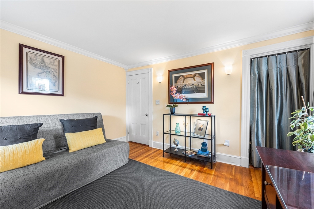 34 Cedar Street Wakefield, MA 01880 - Photo 20 of 33 a bedroom with furniture and a gate