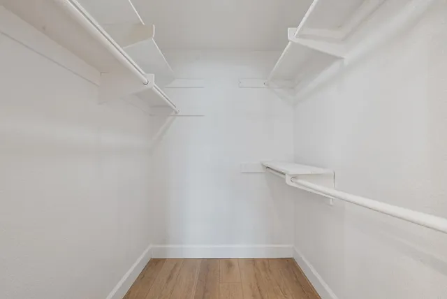 a view of a room with racks on the wall