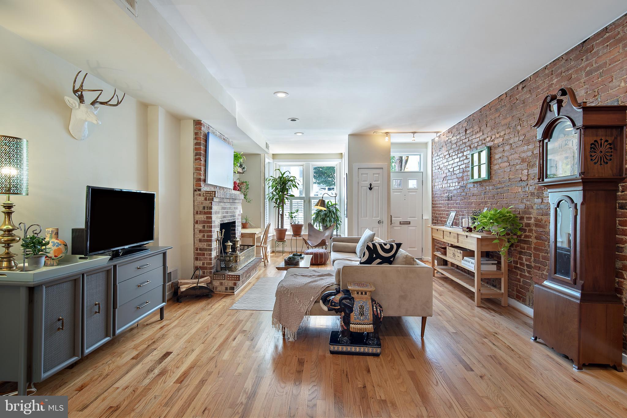 1220 D Street Northeast Washington, DC 20002 - Photo 5 of 33 Hardwood floors & exposed brick
