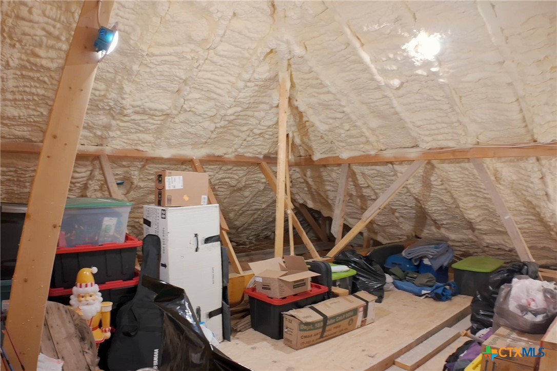 1001 County Road 3152 Kempner, TX 76539 - Photo 38 of 47 Extra storage in attic above the garage- accessible by stairwell.