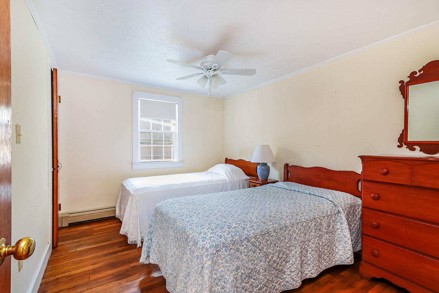 35 Susan Ruth Road Dennis Port, MA 02639 - Photo 13 of 23 a bedroom with two beds and painting on the wall