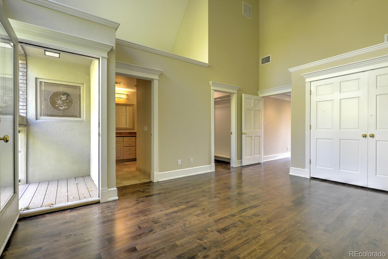 490 Columbine Street Denver, CO 80206 - Photo 27 of 33 a view of empty room with wooden floor
