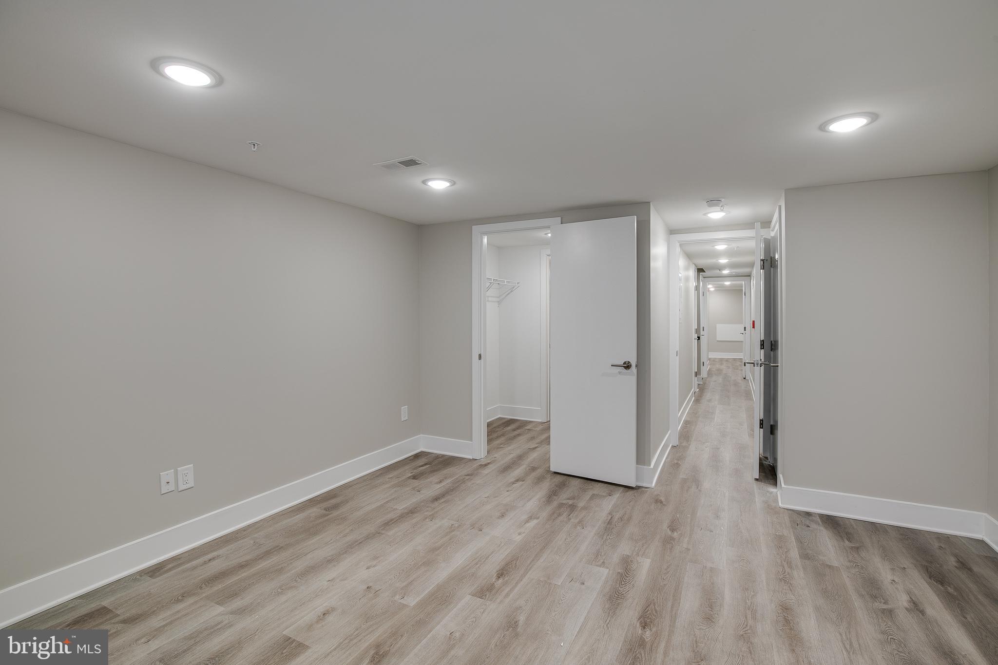 2017 North College Avenue, Unit 1 Philadelphia, PA 19121 - Photo 15 of 27 a view of hallway with wooden floor