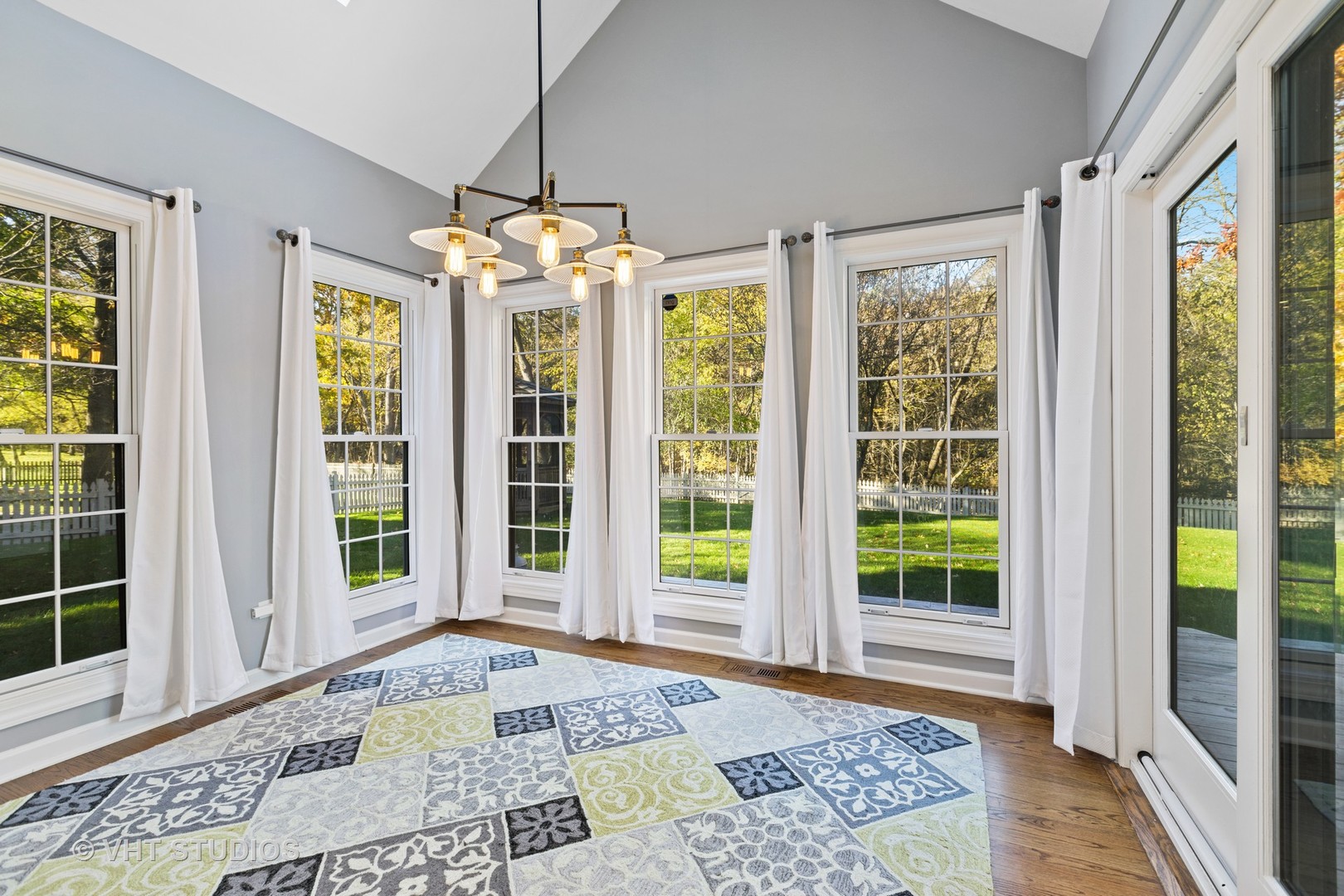470 Long Hill Road Gurnee, IL 60031 - Photo 14 of 32 a view of a big room with windows and chandelier
