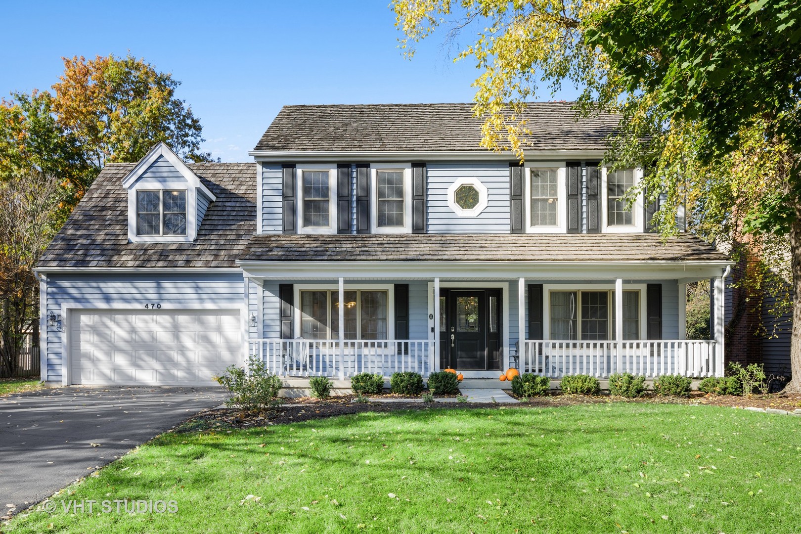 470 Long Hill Road Gurnee, IL 60031 - Photo 2 of 32 a front view of a house with a garden