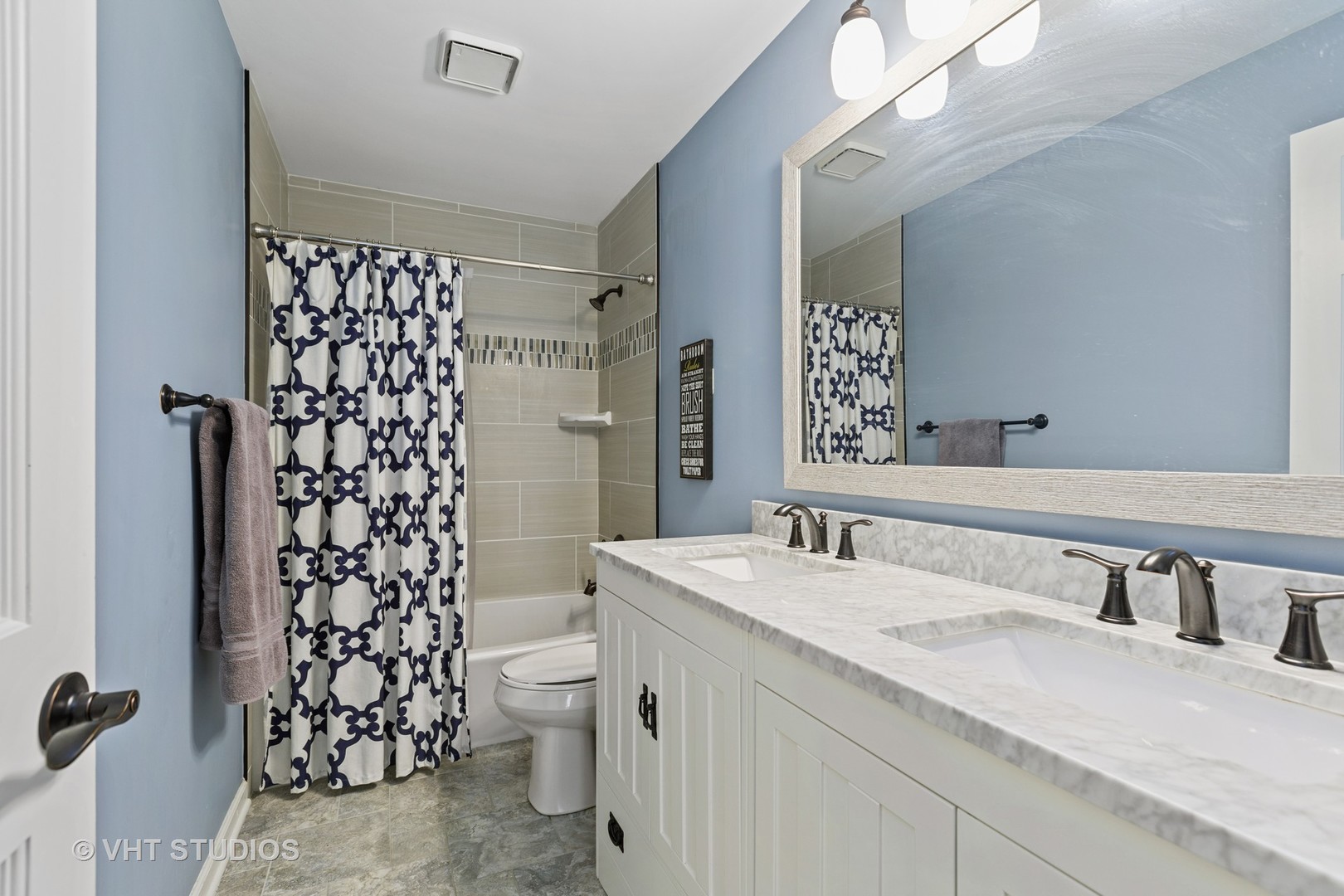 470 Long Hill Road Gurnee, IL 60031 - Photo 22 of 32 a bathroom with a sink a toilet and shower