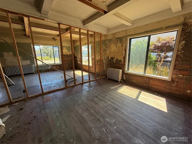 a view of an empty room with a window