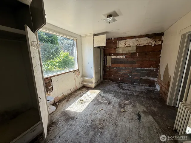 a bathroom with a bathtub and toilet