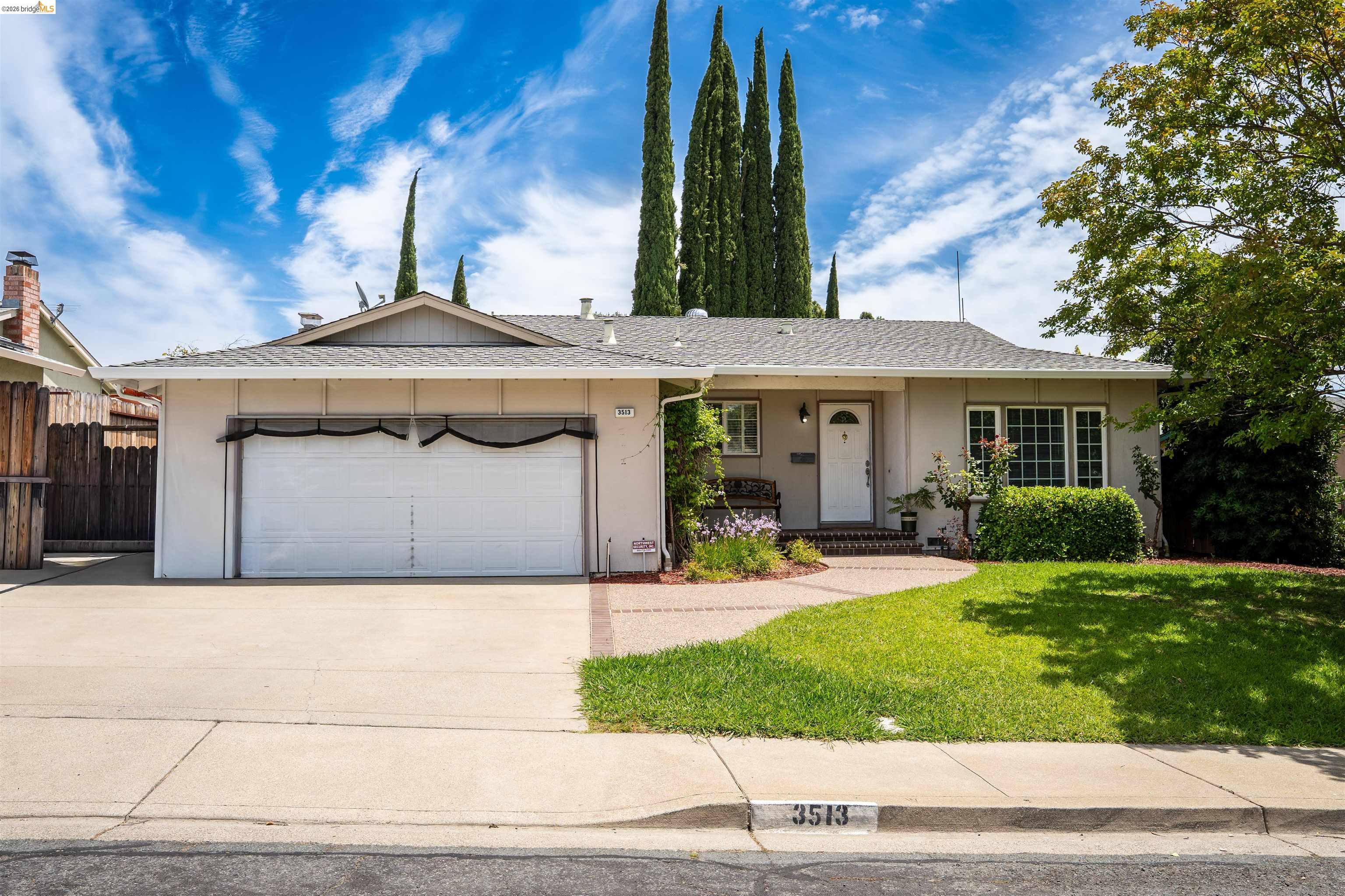 3513 Rio Grande Drive Antioch, CA 94509 - Photo 22 of 22 Single-story home featuring a two-car garage, a concrete driveway, a front lawn, and a paved walkway leading to the front entry