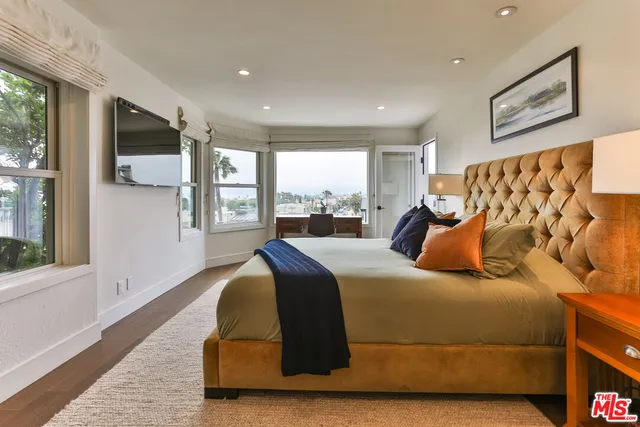 a kitchen with a table and chairs