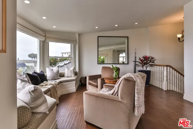 a view of a swimming pool with a lounge chairs