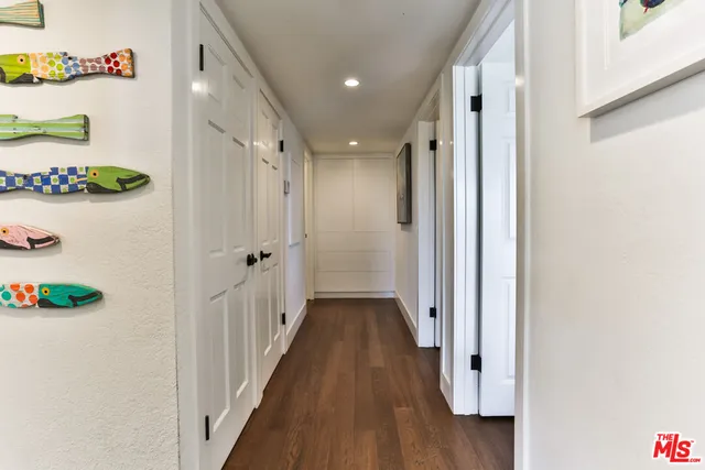 a spacious bedroom with a large bed and a window