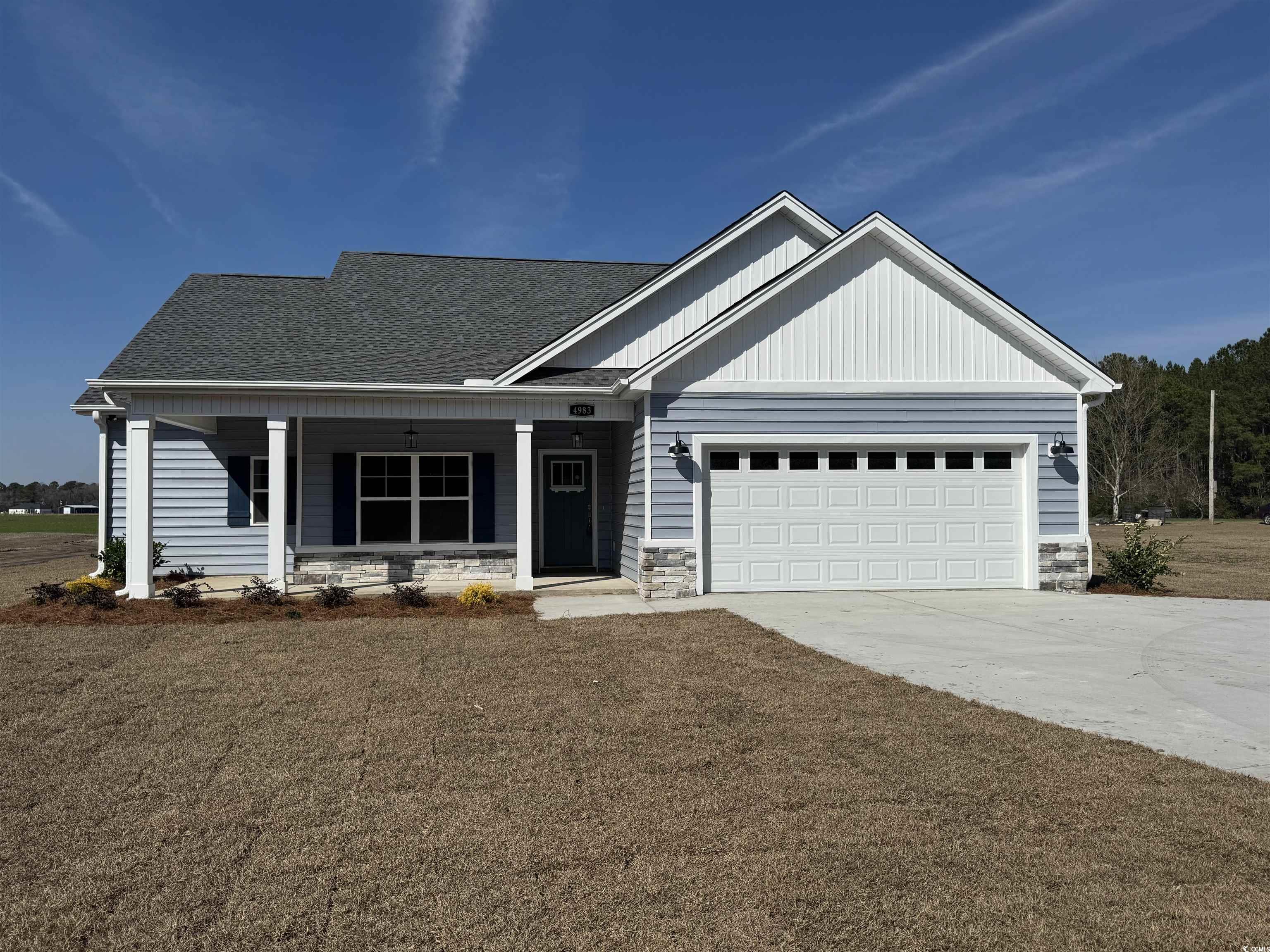 4983 Dupont Road Aynor, SC 29511 - Photo 1 of 27 View of front of house featuring a garage, concret
