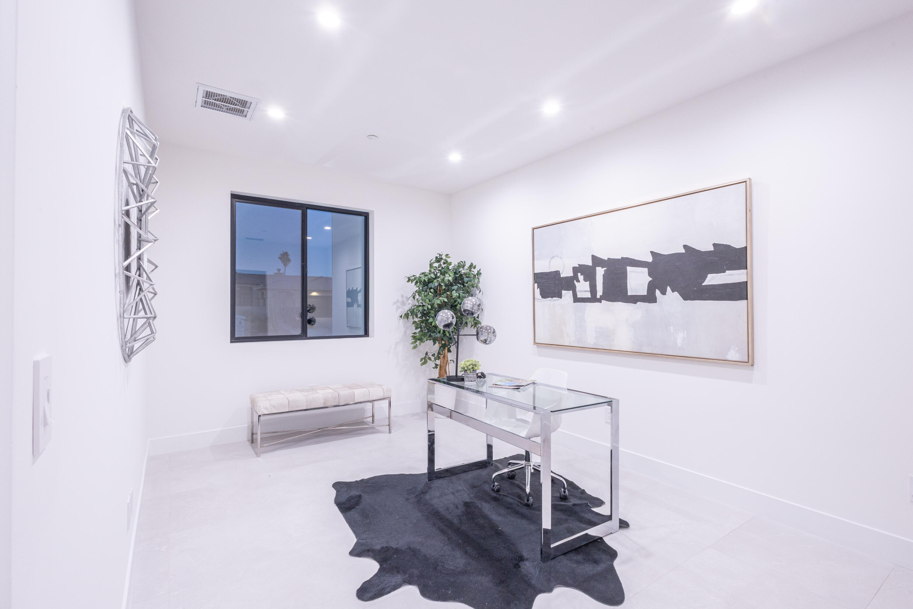 67385 Ovante Road Cathedral City, CA 92234 - Photo 16 of 32 a living room with furniture and a painting on the wall