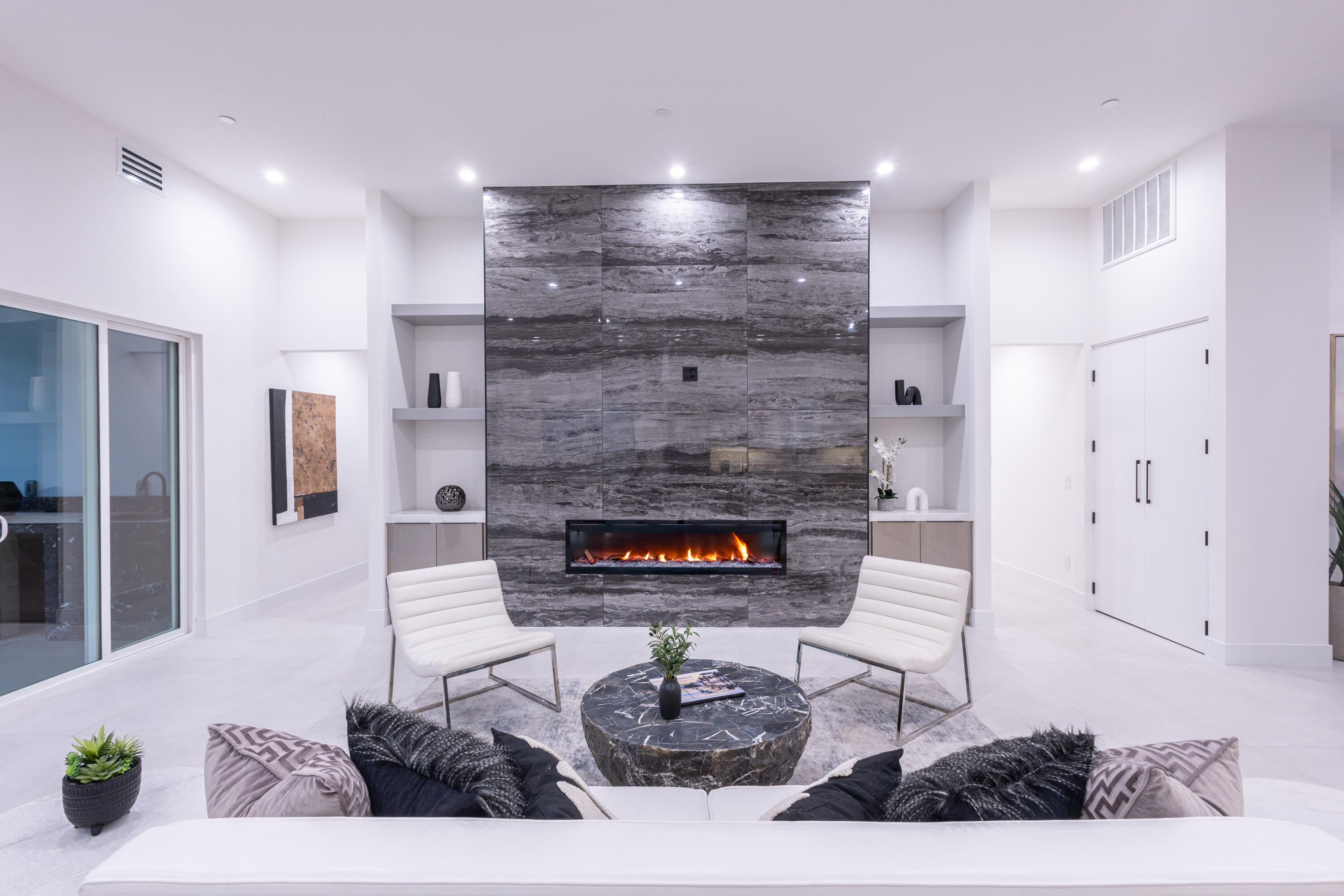 67385 Ovante Road Cathedral City, CA 92234 - Photo 6 of 32 a living room with furniture and a fireplace