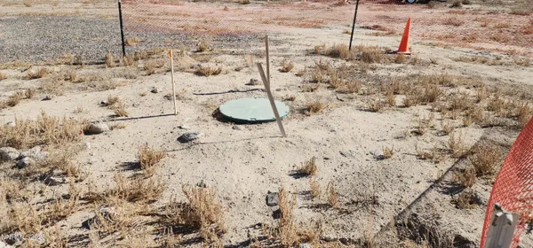 a view of a road with a yard