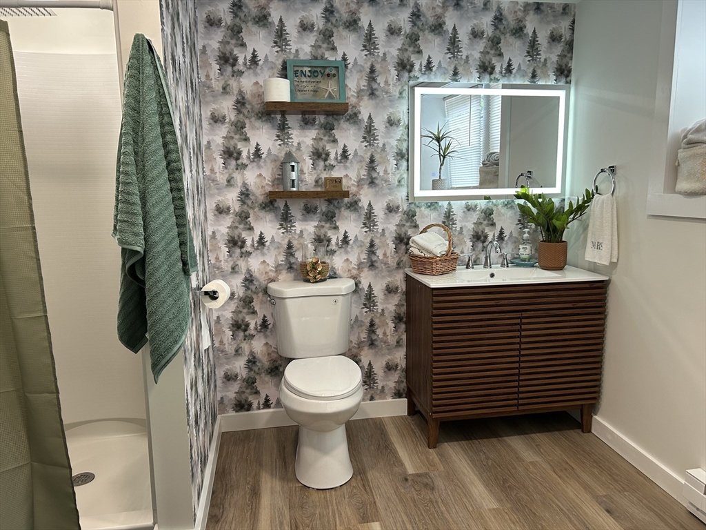 61 Esta Road Plymouth, MA 02360 - Photo 24 of 40 a bathroom with a sink and a toilet