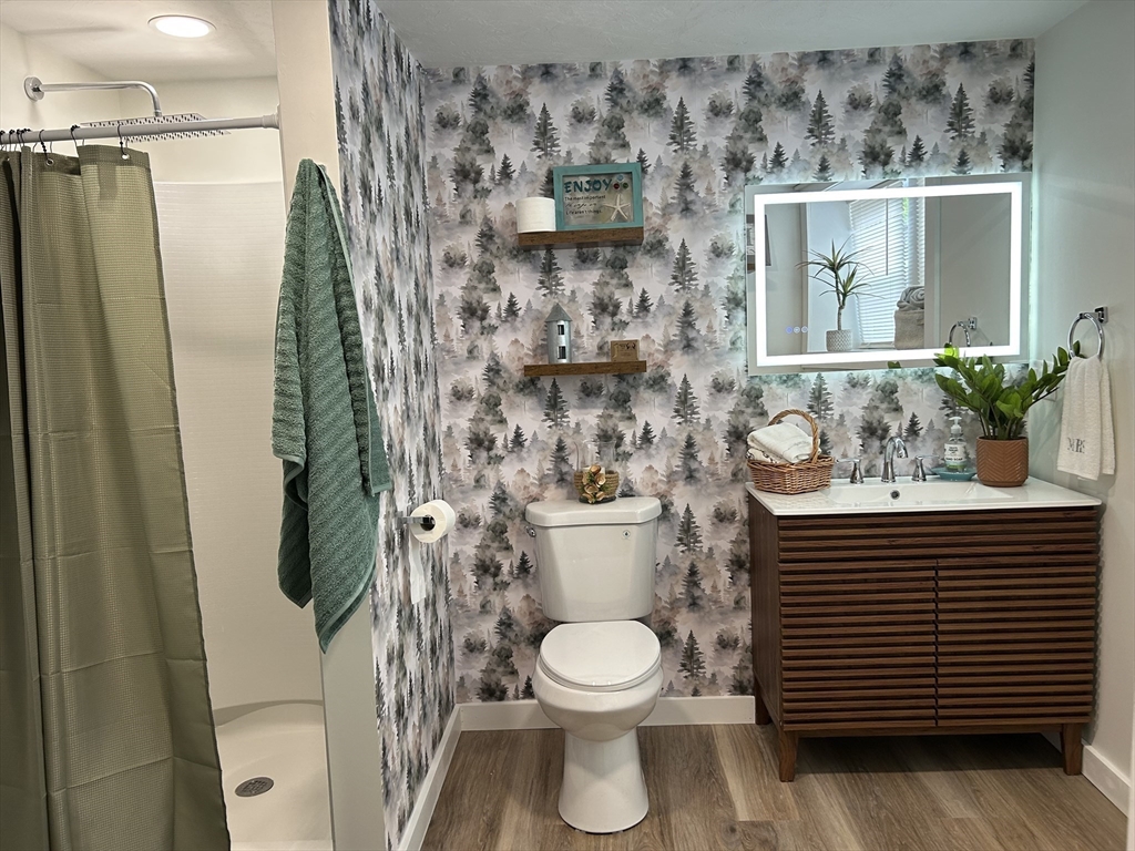 61 Esta Road Plymouth, MA 02360 - Photo 25 of 40 a bathroom with a sink a toilet and shower