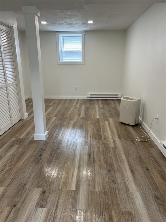 61 Esta Road Plymouth, MA 02360 - Photo 29 of 40 an empty room with wooden floor and a window