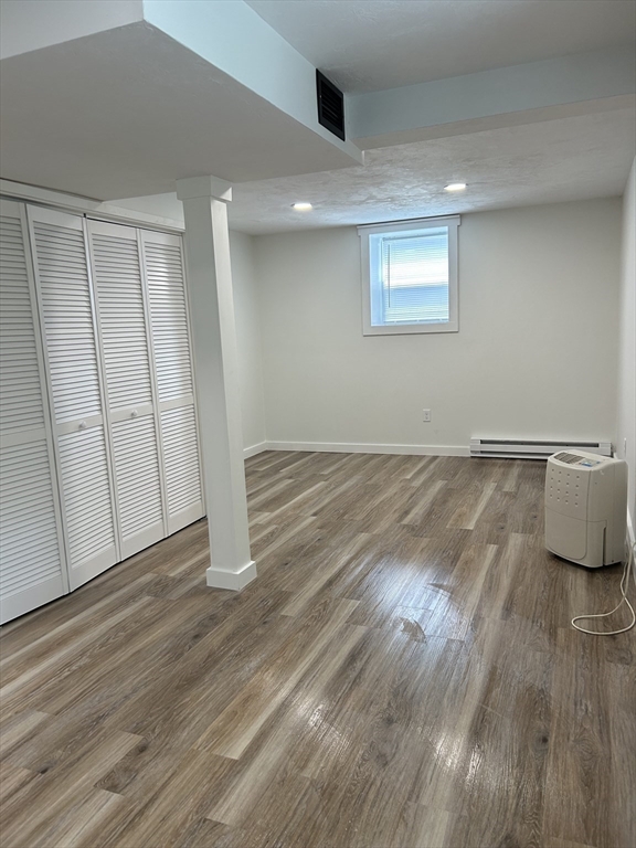 61 Esta Road Plymouth, MA 02360 - Photo 31 of 40 a view of an empty room with wooden floor