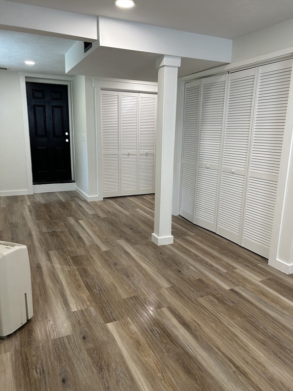 61 Esta Road Plymouth, MA 02360 - Photo 32 of 40 a view of an empty room with wooden floor and a window