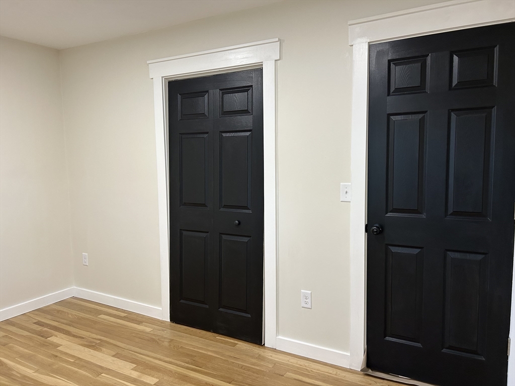 61 Esta Road Plymouth, MA 02360 - Photo 35 of 40 wooden floor and windows in a room