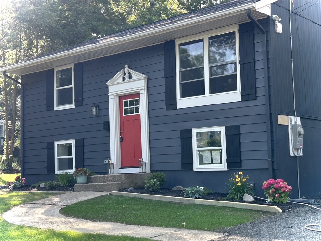 61 Esta Road Plymouth, MA 02360 - Photo 4 of 40 a front view of a house with yard
